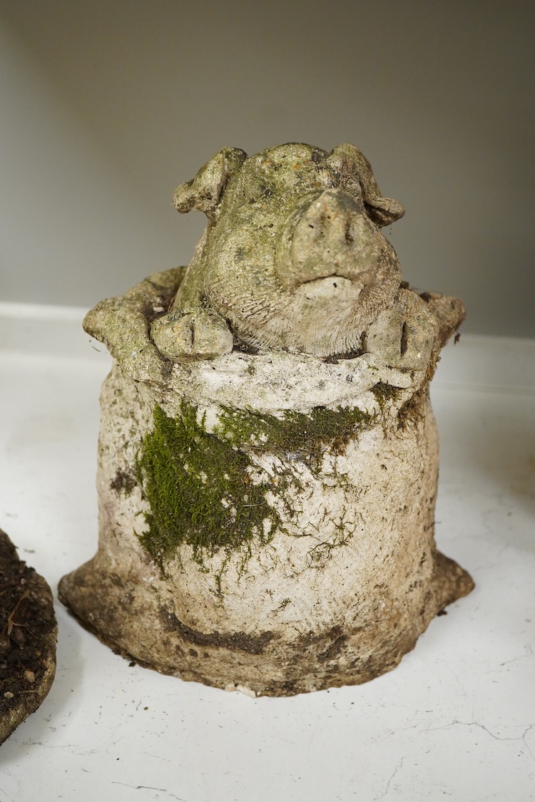 A garden composition stone model of a pig - 29cm high and a similar toad
